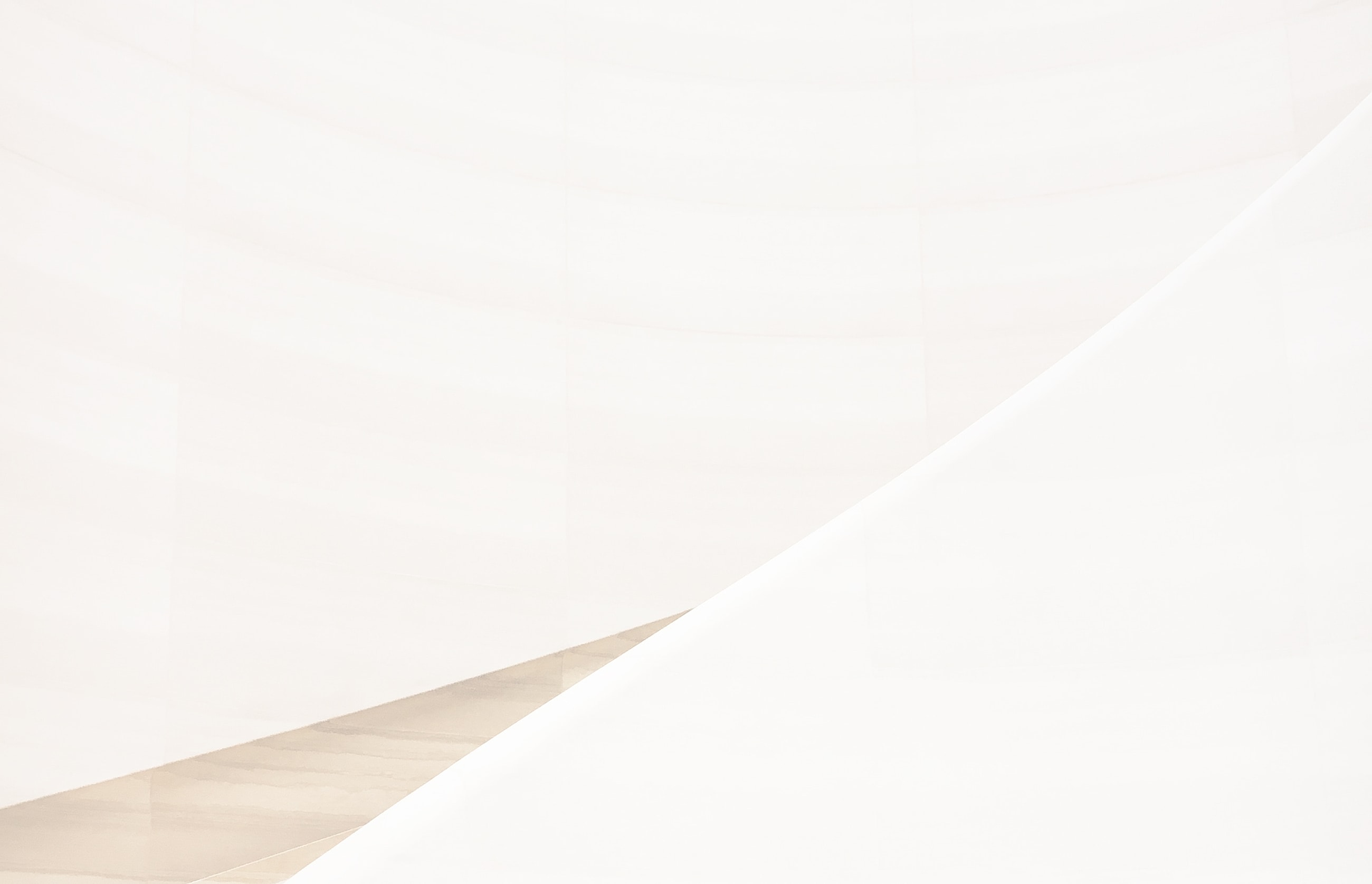 Abstract white geometric shapes and lines.